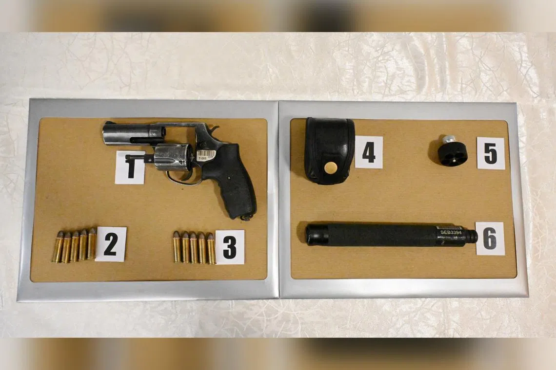 The man had been carrying a fully-loaded Taurus revolver, which had five bullets, a speed loader with another five bullets, and a baton in a pouch. 