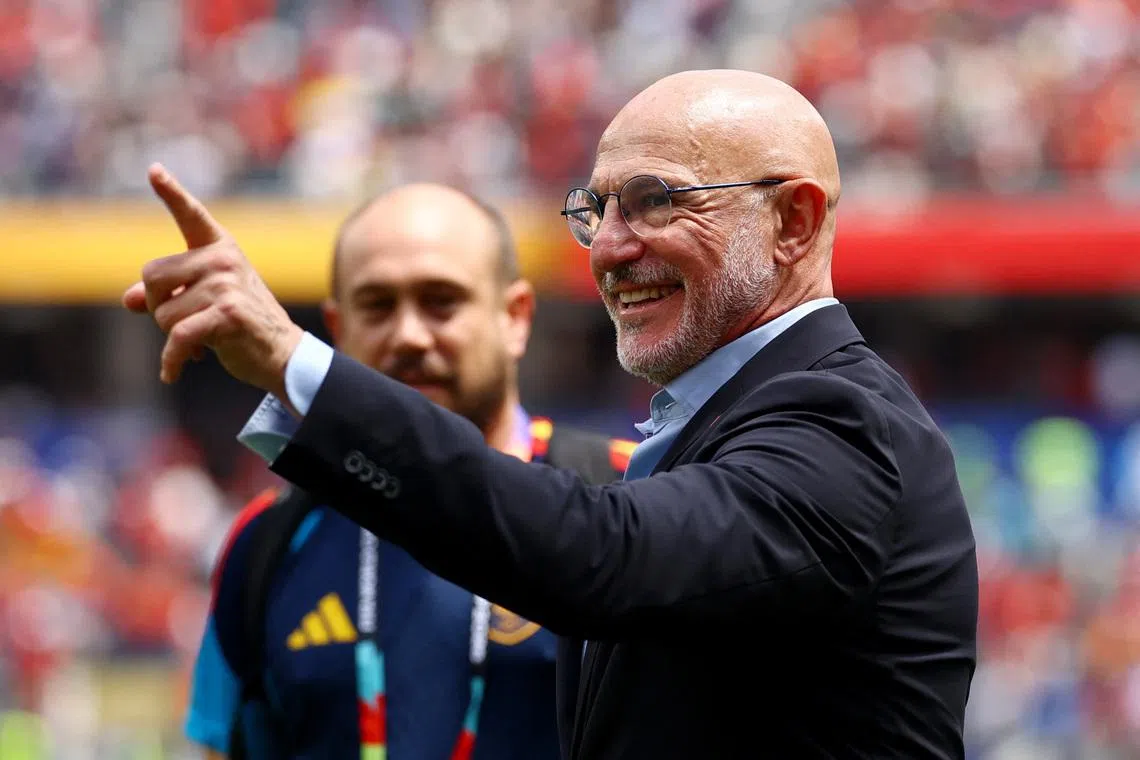 Spain coach Luis De La Fuente celebrates after the match as Spain qualify for the semi finals of the World Cup.