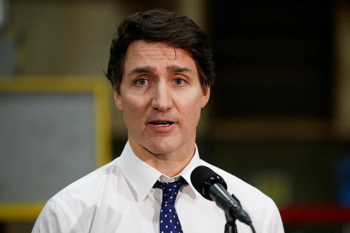 FILE PHOTO: Canada’s Prime Minister Justin Trudeau speaks to the media after touring the Anchor Danly manufacturing plant in Windsor, Ontario, Canada. January 16, 2025.    REUTERS/Rebecca Cook/File Photo