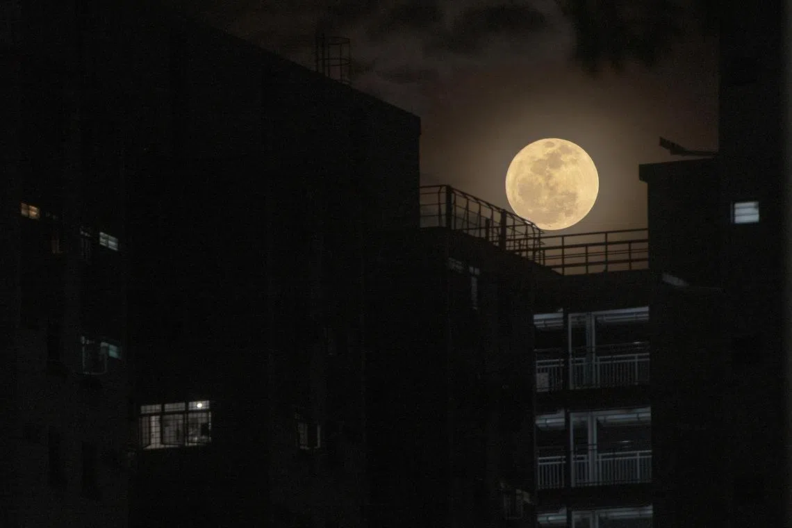 The super moon on July 3, 2023 as seen from Victoria Street at around 8.04pm. The super moon is the first of four that will appear throughout this year. A super moon is a full moon that orbits closest to Earth, making it appear larger and brighter than usual.The buck moon was about 362,000km from the Earth at its nearest point.This super moon derives its unique name from the natural cycle of male deer, known as bucks, that begin growing new antlers during this time of the year across the world.