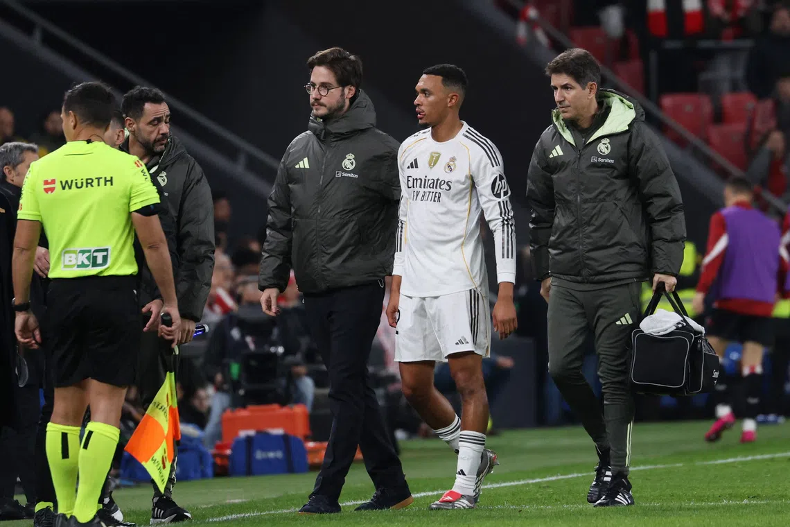 Soccer Football - LaLiga - Athletic Bilbao v Real Madrid - San Mames, Bilbao, Spain - December 3, 2025 Real Madrid's Trent Alexander-Arnold walks off the pitch after sustaining an injury REUTERS/Pankra Nieto