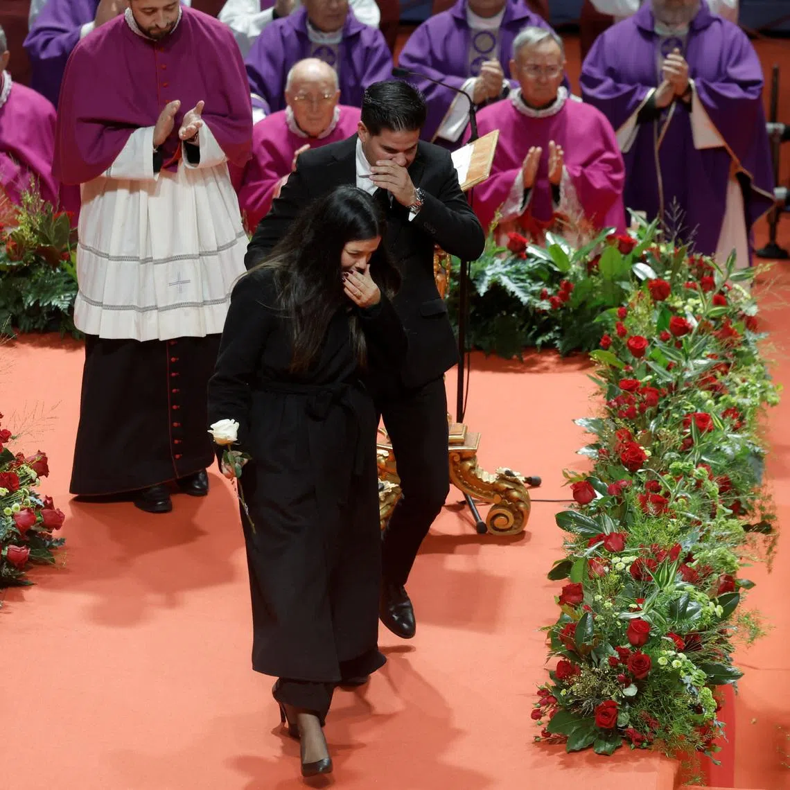 Lilian Sainz, a relative of a victim of the deadly derailment of two high-speed trains in Adamuz, reacts after giving a speech during a funeral mass in memory of the victims, at the Carolina Marin Sports Palace in Huelva, Spain, January 29, 2026. REUTERS/Jon Nazca