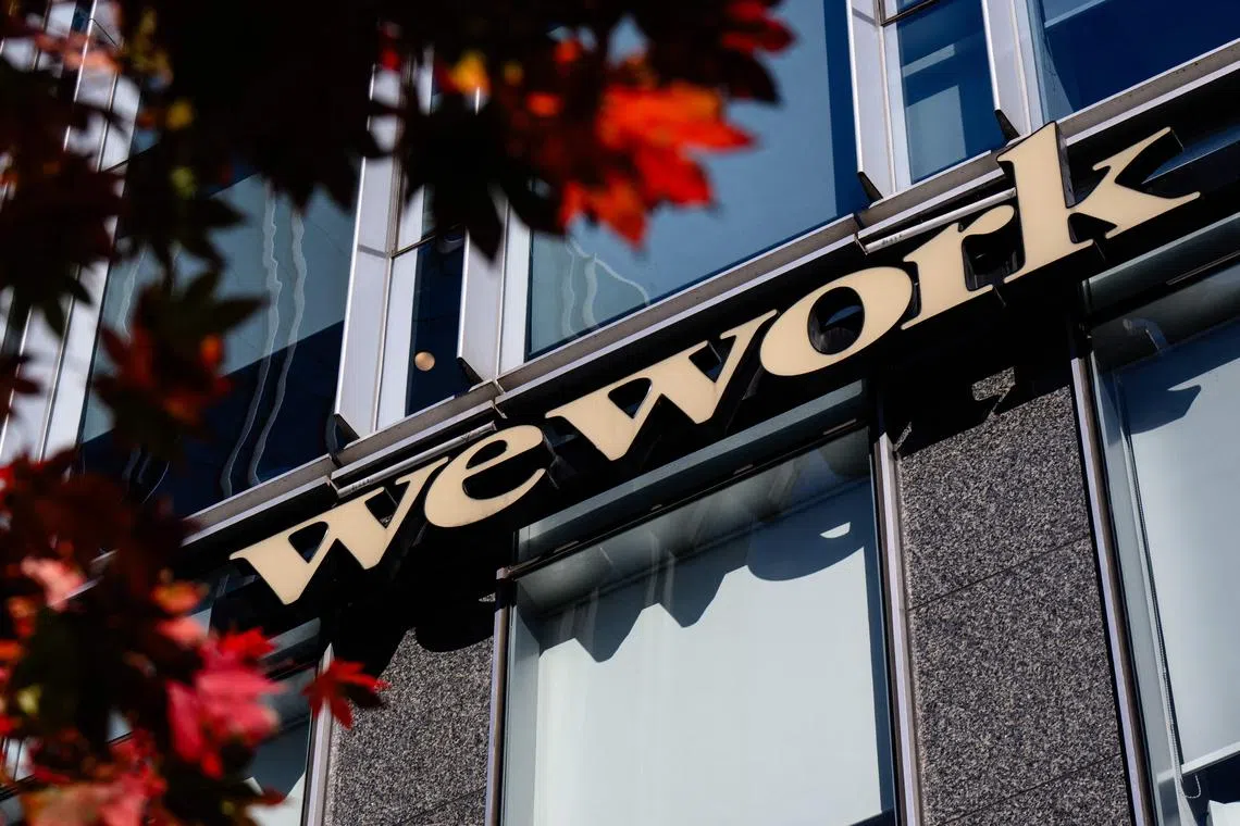 Signage for shared office giant WeWork is seen outside a building in Seoul on November 7, 2023. WeWork reached a new agreement with its landlord for its space at 1440 Broadway, Manhattan.