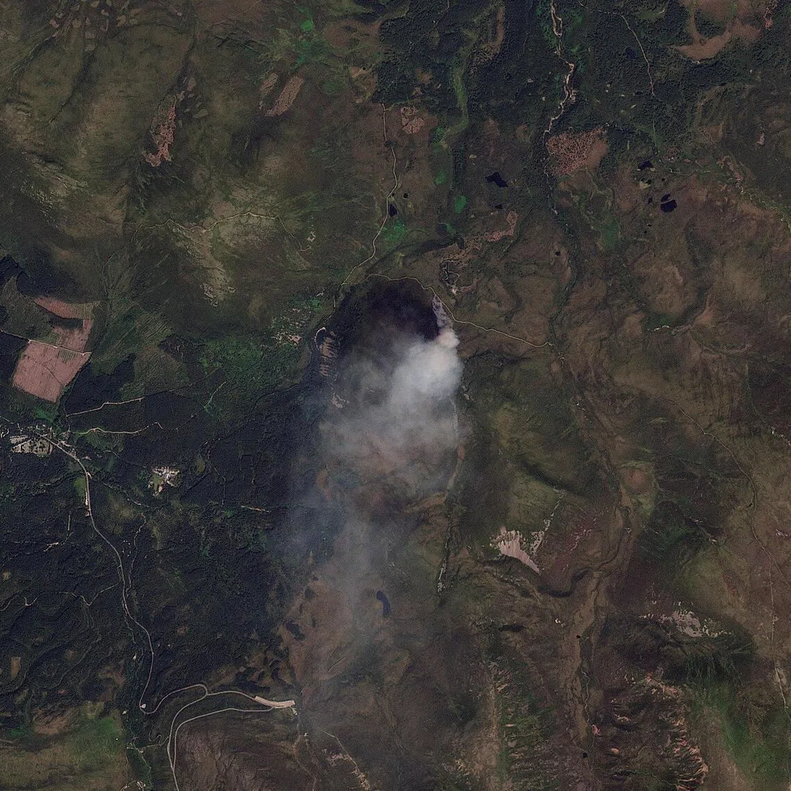 A satellite image shows smoke from a wildfire in Cairngorms National Park on July 15.