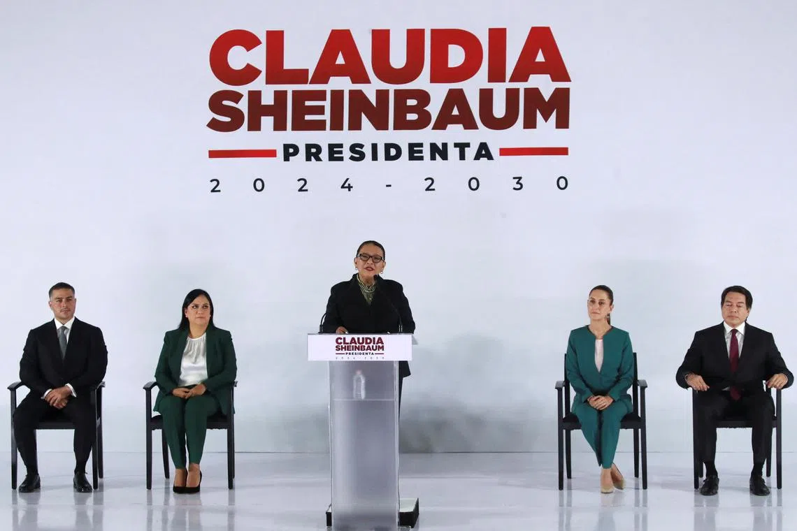 Rosa Icela Rodriguez, appointed as Interior Minister, speaks as Mario Delgado Carrillo, appointed as Public Education Minister, Ariadna Montiel Reyes, appointed as Welfare Minister, Omar Garcia Harfuch, appointed as Security Minister, and Mexican President-elect Claudia Sheinbaum look on during the announcement of members of the Presidential cabinet in Mexico City, Mexico, July 4, 2024. REUTERS/Henry Romero