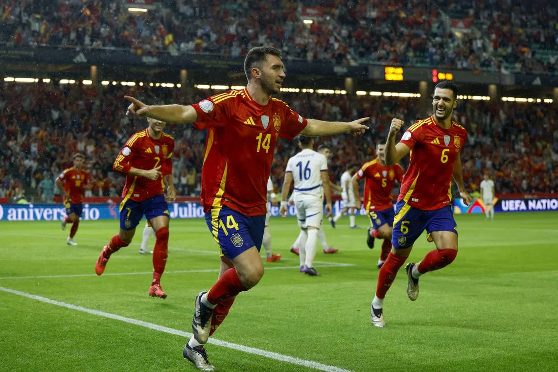 Spain's Aymeric Laporte celebrates after scoring the 1-0 goal during the match between Spain and Serbia, in Cordoba.
