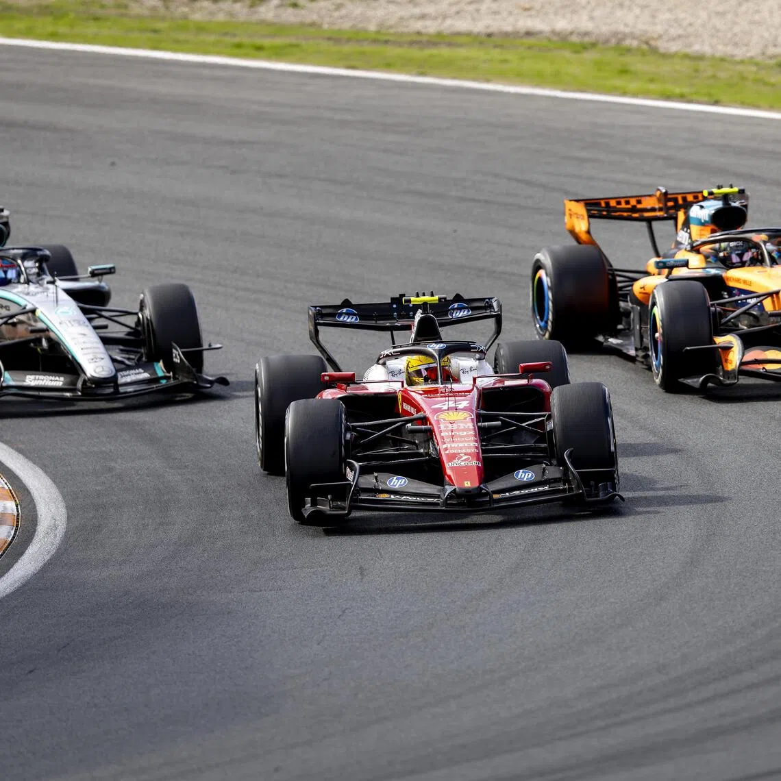 (From left) Mercedes driver Andrea Kimi Antonelli, Scuderia Ferrari driver Lewis Hamilton and McLaren driver Lando Norris at the Dutch Grand Prix on Aug 23.