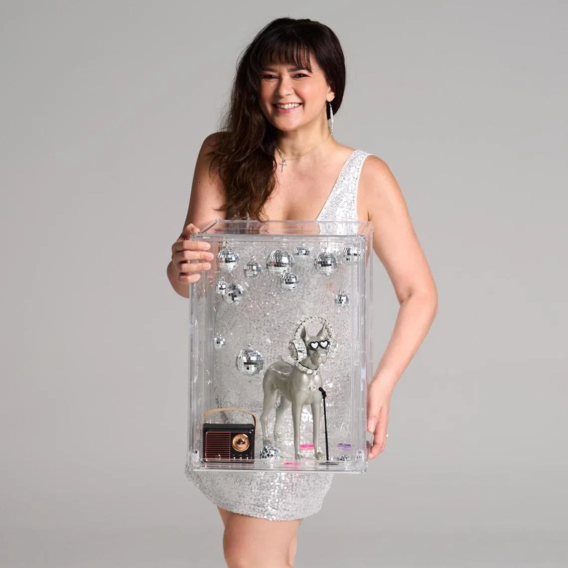 jspets07 - Former radio DJ Cheryl Miles and her painted dog mascot for Paws For A Cause, an online auction where 100 per cent of proceeds go to charity SOSD.

SOURCE / COPYRIGHT: PAWS FOR A CAUSE