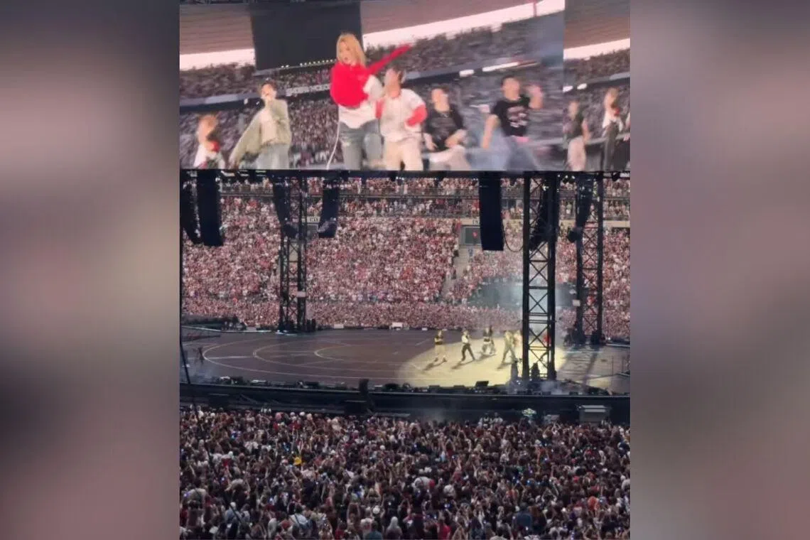Macron makes appearance at BTS show in Paris
