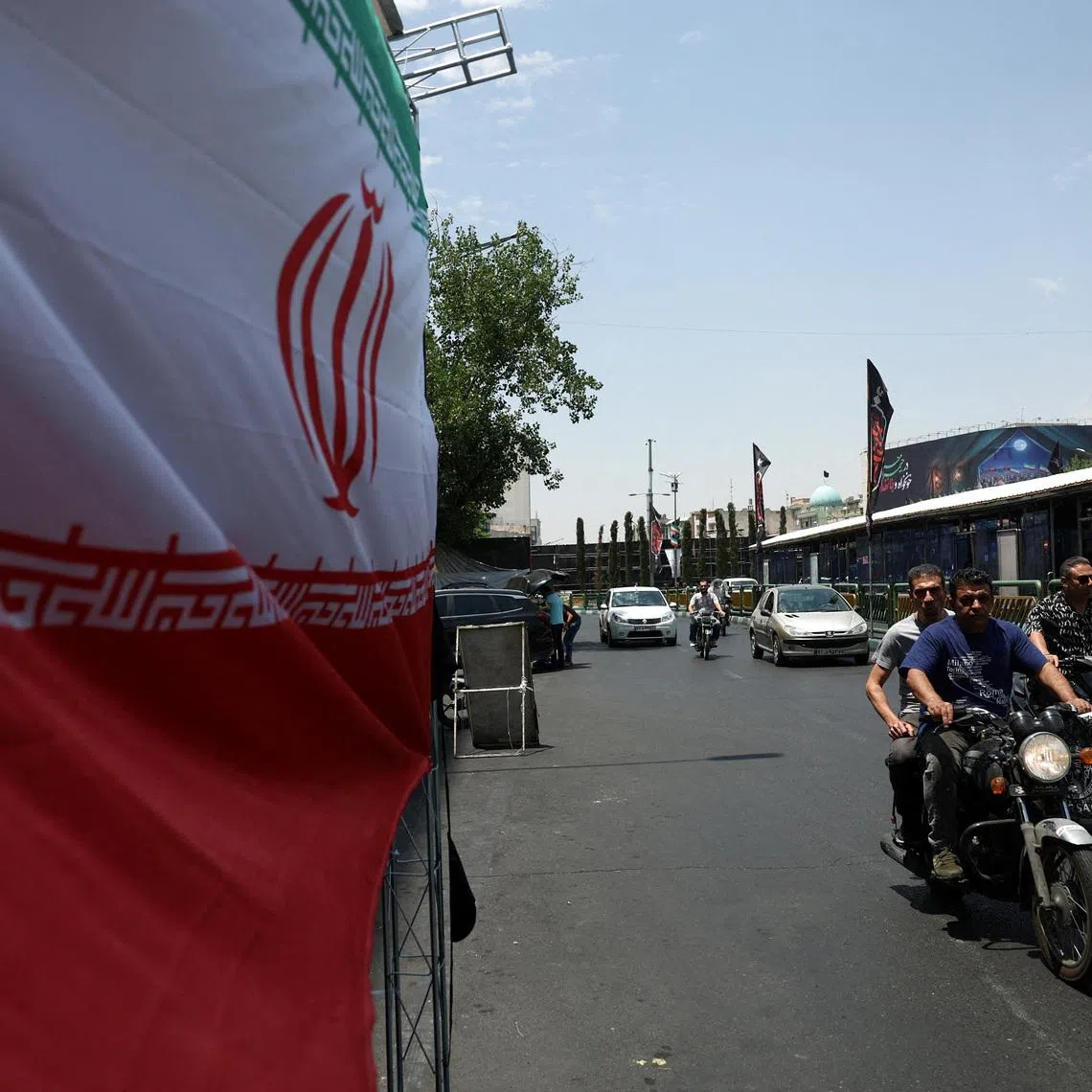 People drive on a street in Tehran, Iran, June 18, 2026. Majid Asgaripour/WANA (West Asia News Agency) via REUTERS