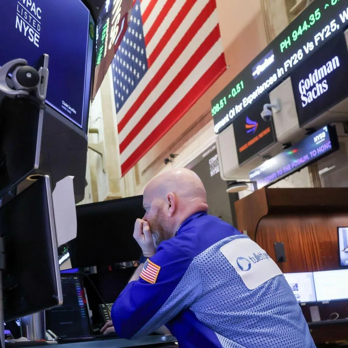A trader working on the floor the New York Stock Exchange, in New York City.