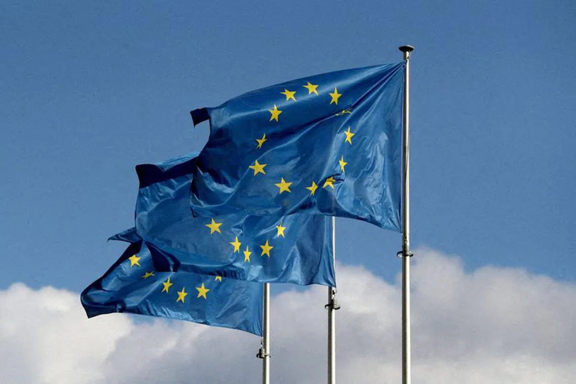 FILE PHOTO: European Union flags fly outside the EU Commission headquarters in Brussels, Belgium September 19, 2019. REUTERS/Yves Herman/File Photo/File Photo