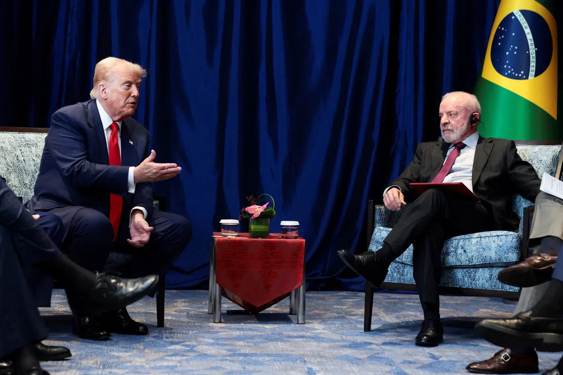 FILE PHOTO: U.S. President Donald Trump and Brazilian President Luiz Inacio Lula da Silva meet on the sidelines of the 47th Association of Southeast Asian Nations (ASEAN) summit in Kuala Lumpur, Malaysia, October 26, 2025. REUTERS/Evelyn Hockstein/ File Photo