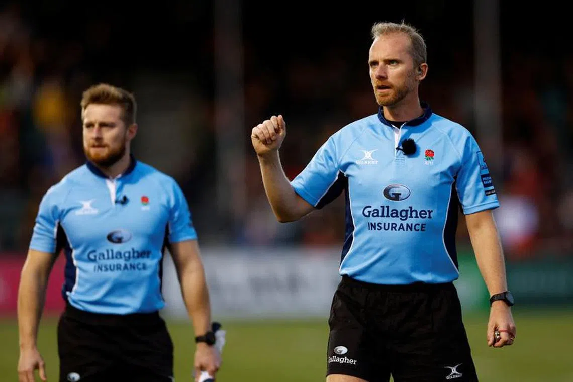 Rugby Union - Premiership - Saracens v Sale Sharks - StoneX Stadium, London, Britain - October 30, 2022 Referee Wayne Barnes watches a replay on a giant screen while making a TMO desicion Action Images/Andrew Boyers