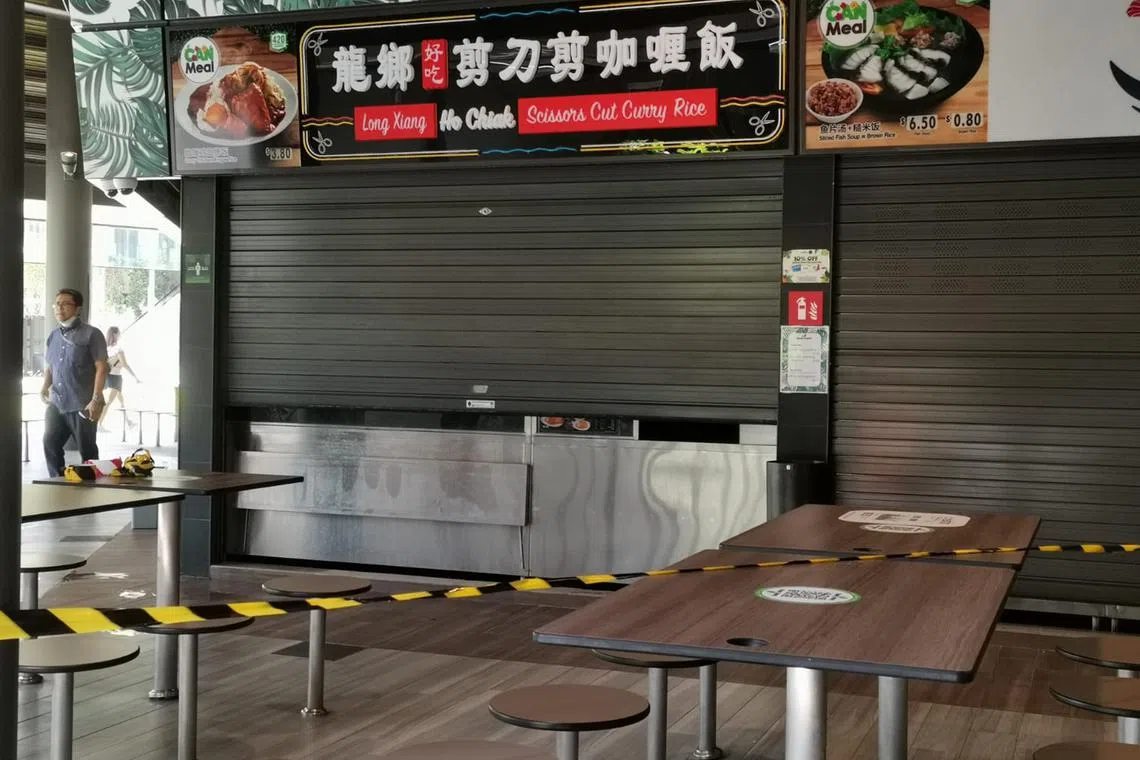An unattended stove at Long Xiang Ho Chiak Scissors Cut Curry Rice (above) caught fire on June 13.