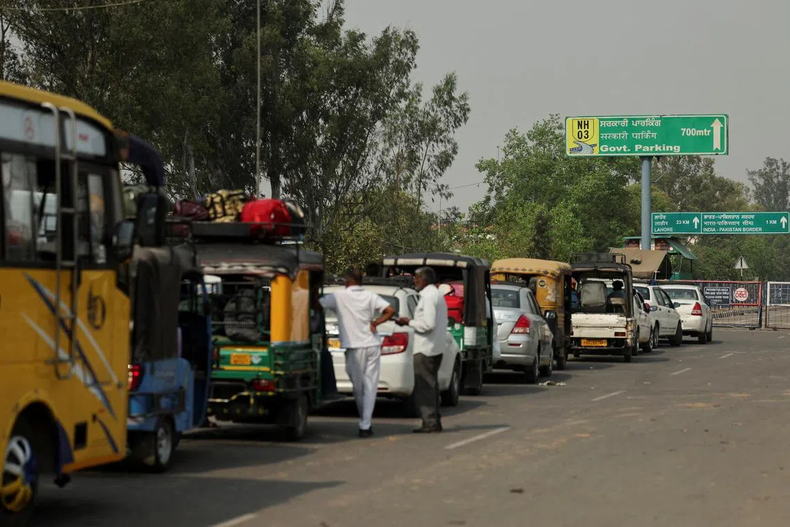 Vehicles wait in a line before making their way to Pakistan at the Attari-Wagah border crossing near Amritsar, India April 30, 2025. REUTERS/Francis Mascarenhas/File Photo