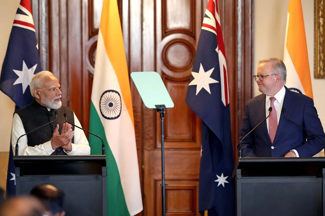 Australian PM Anthony Albanese (right) with the visiting Indian PM Narendra Modi at a press conference at Government House Victoria in Melbourne, on July 9.