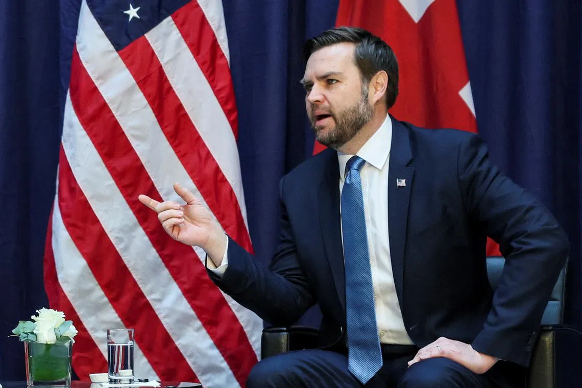 U.S. Vice President JD Vance speaks as he participates in a bilateral meeting with British Foreign Minister David Lammy at the Commerzbank in Munich, Germany, February 14, 2025. REUTERS/Leah Millis