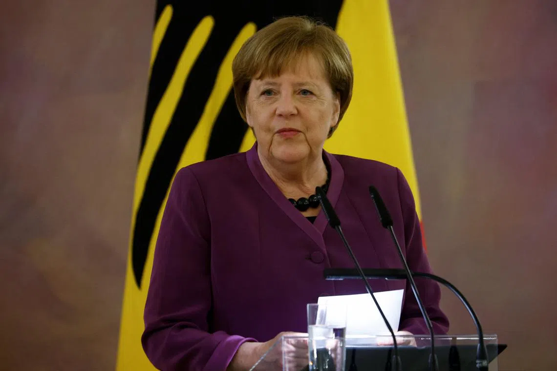FILE PHOTO: Former Chancellor Angela Merkel, recipient of the country's highest Order of Merit or \"Grosskreuz des Verdienstordens der Bundesrepublik Deutschland in besonderer Ausfuehrung\", speaks during a Ceremony in Bellevue Palace in Berlin, Germany April 17, 2023. REUTERS/Michele Tantussi/File Photo
