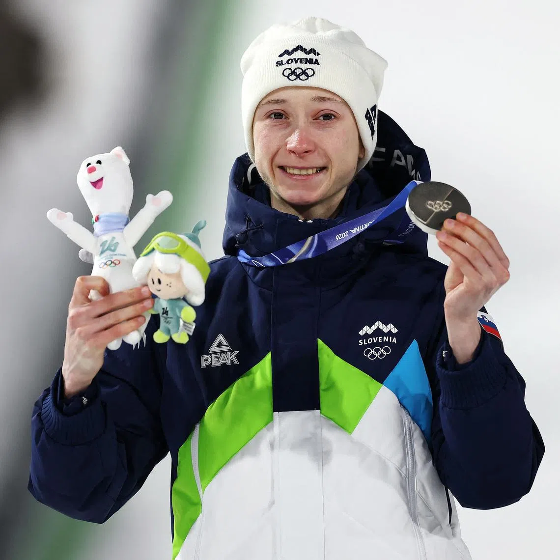 Milano Cortina 2026 Olympics - Ski Jumping - Women's Normal Hill Individual Victory Ceremony - Predazzo Ski Jumping Stadium, Predazzo, Italy - February 07, 2026. Silver medallist Nika Prevc of Slovenia celebrates on the podium after finishing second in the Women's Normal Hill Individual REUTERS/Kacper Pempel