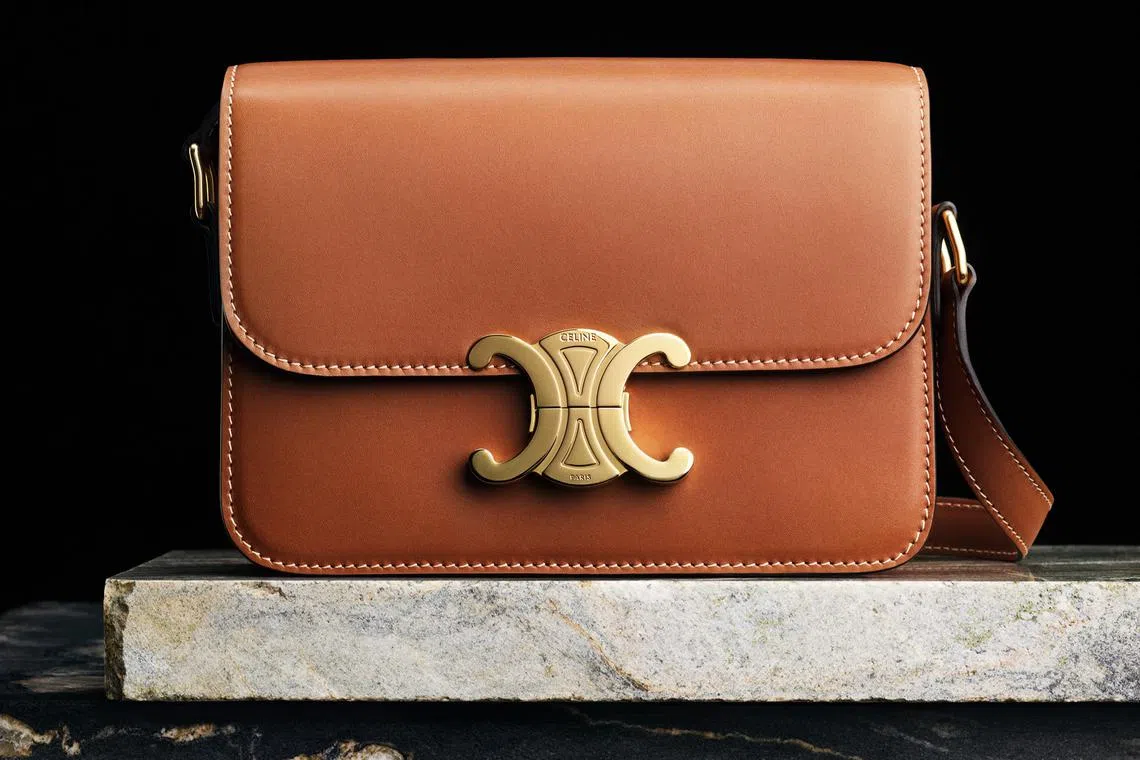 celine triomphe bag in tan finish and signature two mirrored cs gold clasp