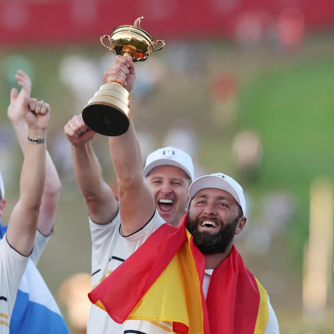 FILE PHOTO: Golf - The 2025 Ryder Cup - Bethpage Black Golf Course, Farmingdale, New York, United States - September 28, 2025
Team Europe's Jon Rahm  celebrates with the trophy during the presentation after winning the Ryder Cup REUTERS/Paul Childs/File Photo
