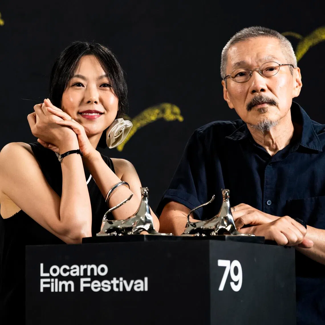 Actress Kim Min-hee (left) and her partner, director Hong Sang-soo, at a photocall at the Locarno Film Festival in Switzerland on Aug 15, 2026.
