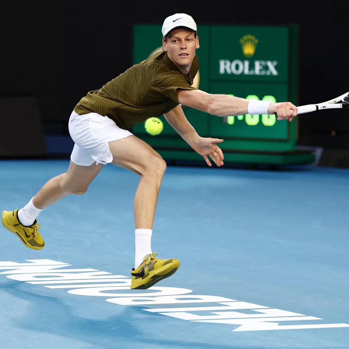 Tennis - Australian Open - Melbourne Park, Melbourne, Australia - January 26, 2026 Italy's Jannik Sinner in action during his fourth round match against Italy's Luciano Darderi REUTERS/Tingshu Wang