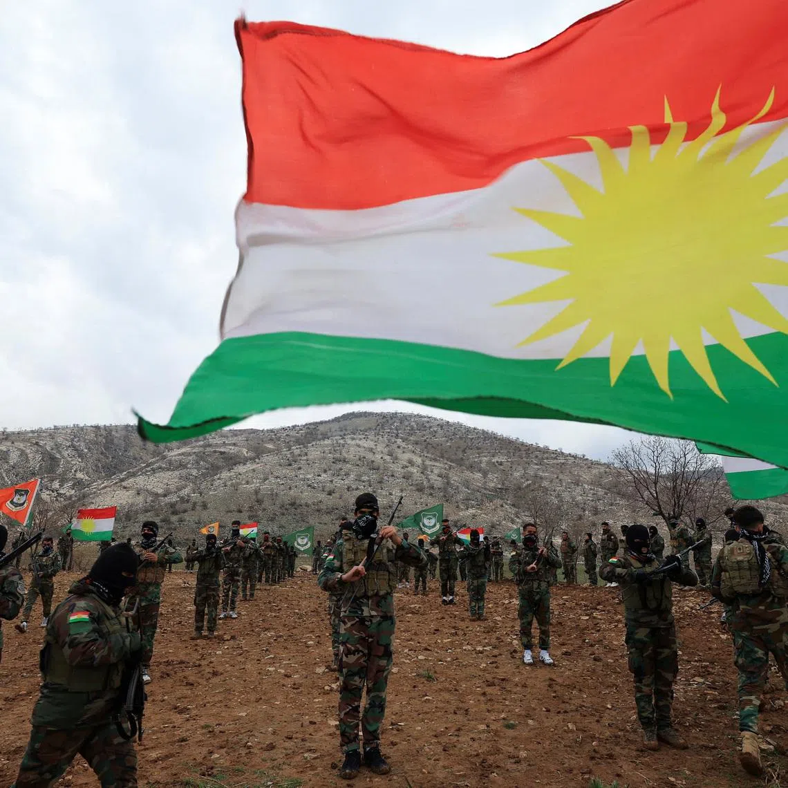 FILE PHOTO: Iranian Kurdish fighters from the Kurdistan Freedom Party (PAK) take part in a training session at a base on the outskirts of Erbil, Iraq February 12, 2026. REUTERS/Thaier Al-Sudani/File Photo
