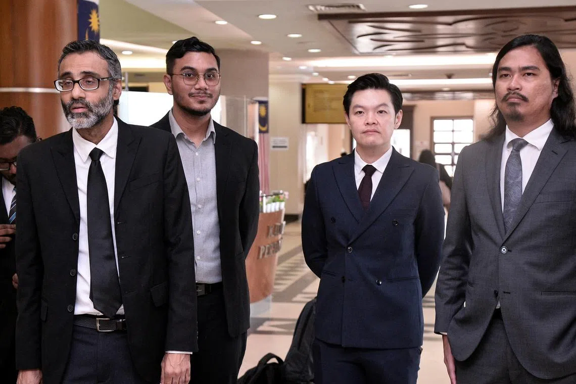 Director Khairi Anwar Jailani (second from left) and producer Tan Meng Kheng (third from left) could face a one-year jail term if found guilty.