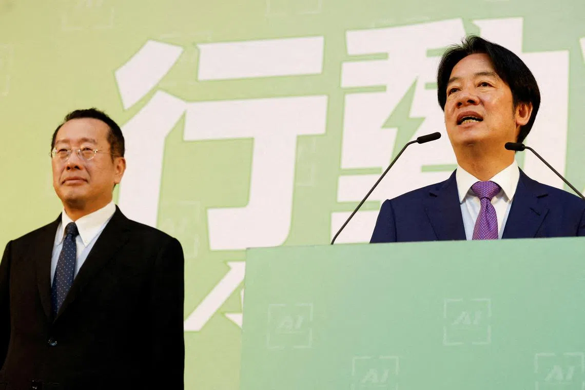 FILE PHOTO: Taiwan President-elect Lai Ching-te speaks as Incoming Defence Minister Wellington Koo stands next to him during a press conference where incoming cabinet members are announced, in Taipei, Taiwan April 25, 2024. REUTERS/Carlos Garcia Rawlins/File Photo