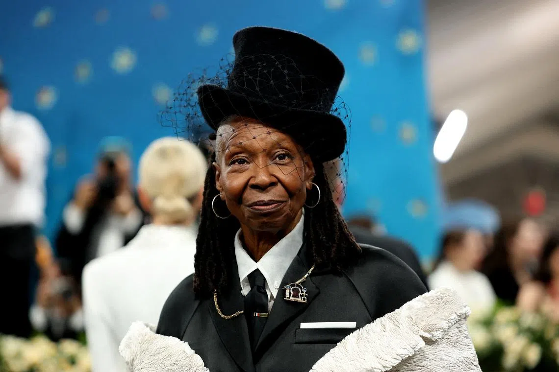 FILE PHOTO: Whoopi Goldberg poses during the Met Gala, an annual fundraising gala held for the benefit of the Metropolitan Museum of Art's Costume Institute with this year's theme 'Superfine: Tailoring Black Style,' in New York City, New York, U.S., May 5, 2025. REUTERS/Mario Anzuoni/File Photo