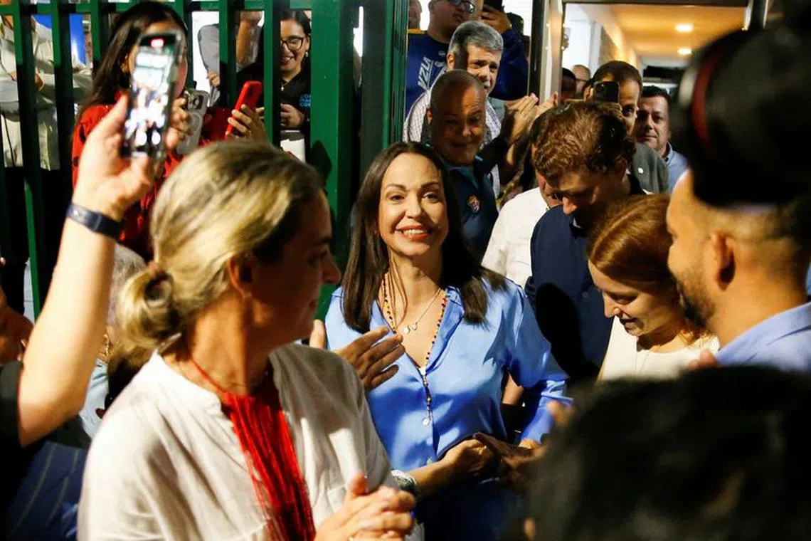 Industrial engineer and former lawmaker Maria Corina Machado reacts to the vote count, after Venezuelans voted in a primary to choose a unity opposition candidate to face Venezuela's President Nicolas Maduro in his probable re-election bid in 2024, in Caracas, Venezuela October 23, 2023. REUTERS/Leonardo Fernandez Viloria