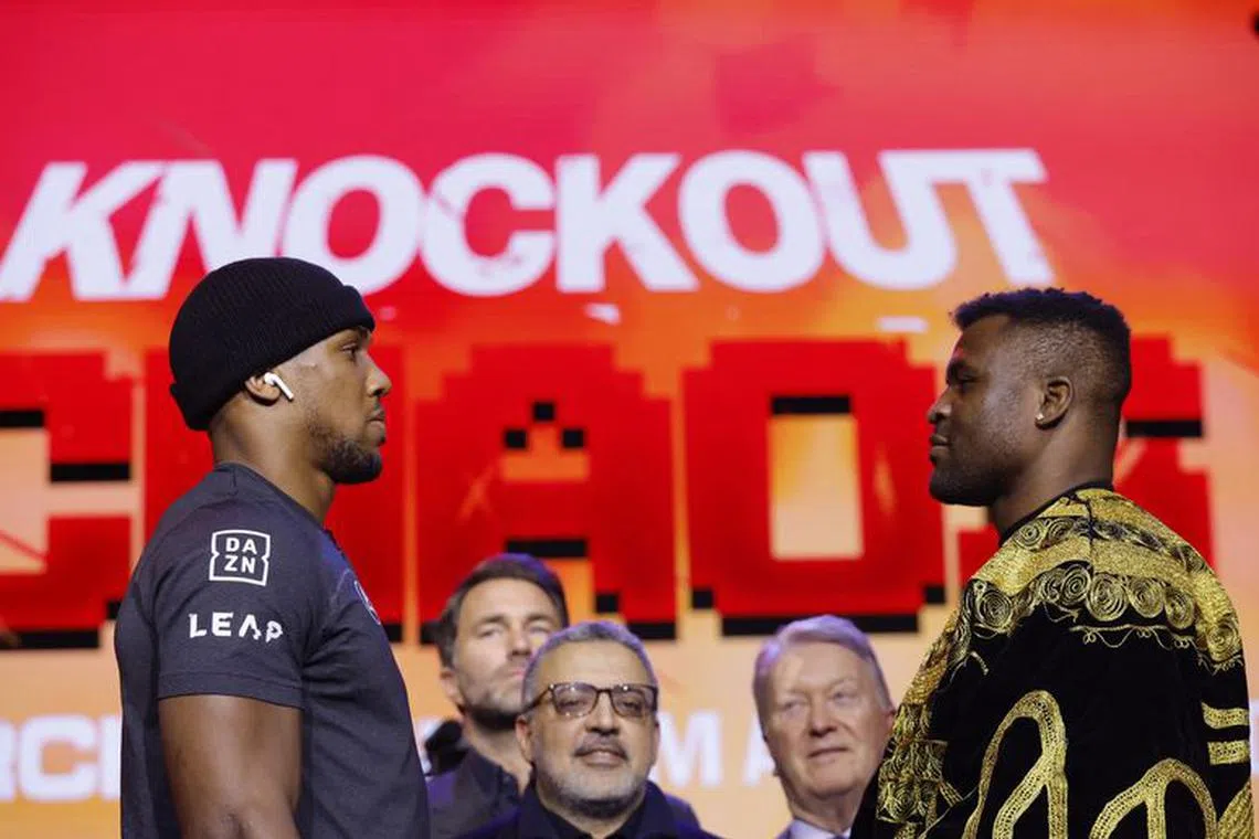Boxing - Anthony Joshua & Francis Ngannou - Press Conference - HERE at Outernet, London, Britain - January 15, 2024 Anthony Joshua and Francis Ngannou face off during the press conference Action Images via Reuters/Andrew Couldridge