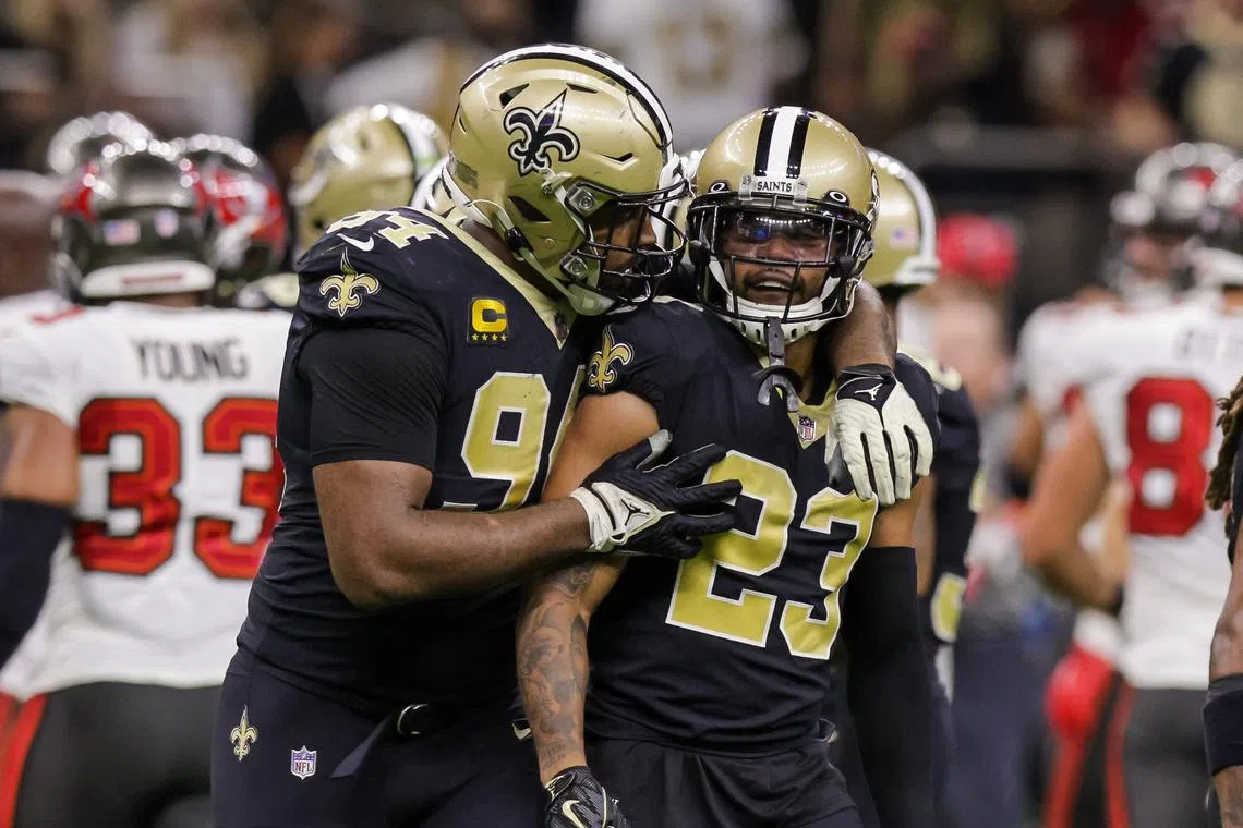 Sep 18, 2022; New Orleans, Louisiana, USA; New Orleans Saints defensive end Cameron Jordan (94) consoles cornerback Marshon Lattimore (23) after a play against Tampa Bay Buccaneers wide receiver Mike Evans (13)  during the second half at Caesars Superdome. Mandatory Credit: Stephen Lew-USA TODAY Sports/ File Photo