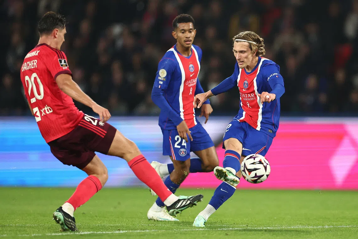 Mika Godts scores PSG’s second goal against Lyon.