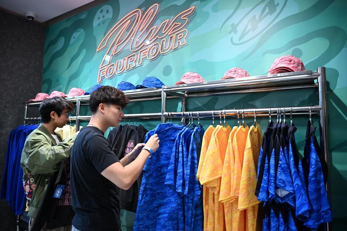 Guests browsing the Singapore collection at Plus44’s pop-up boutique.