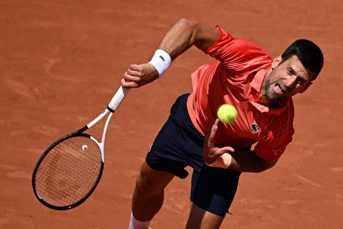 Serbia's Novak Djokovic serving to Aleksandar Kovacevic of the United States during their men's singles match on day two of the Roland-Garros Open tennis tournament at the Court Philippe-Chatrier in Paris on Monday.