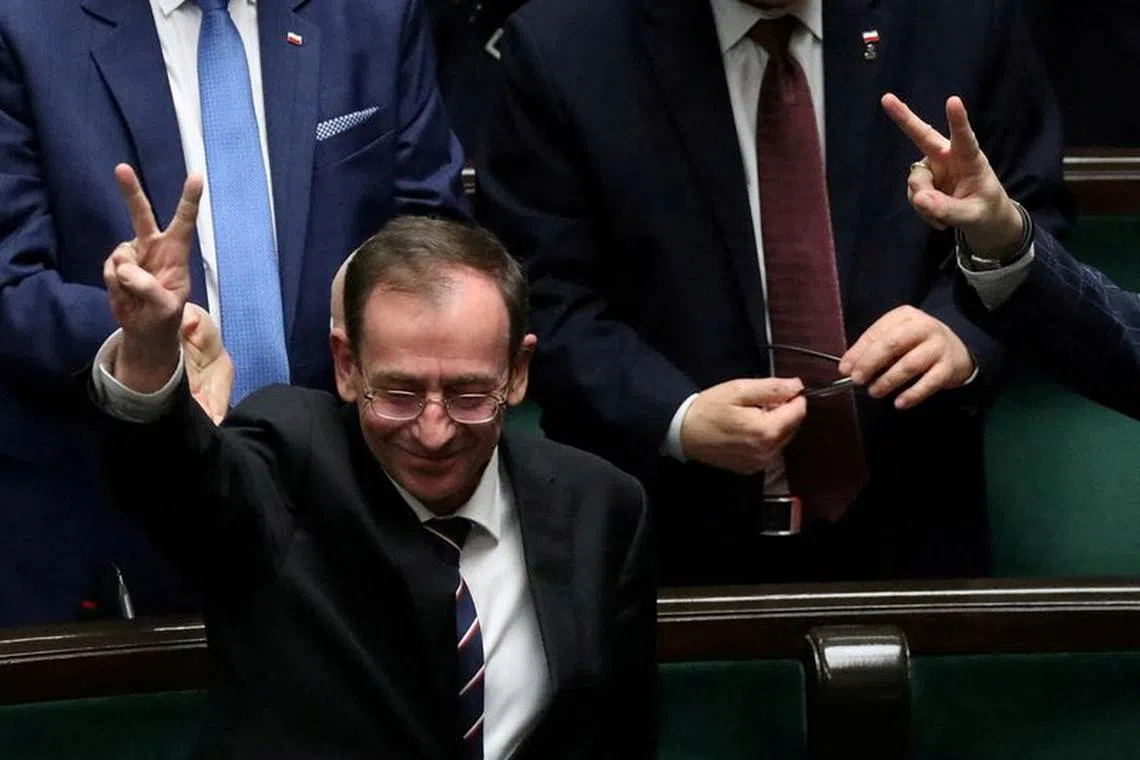 Former Polish Interior Minister Mariusz Kaminski from Law and Justice gestures during a parliamentary session at the parliament in Warsaw, Poland, December 21, 2023. Slawomir Kaminski/Agencja Wyborcza.pl via REUTERS/ File Photo