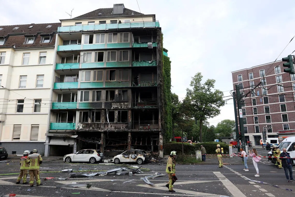 The scene after an overnight explosion inside a kiosk, which killed three people and injured sixteen others, in the western German city of Duesseldorf, Germany, May 16, 2024.    