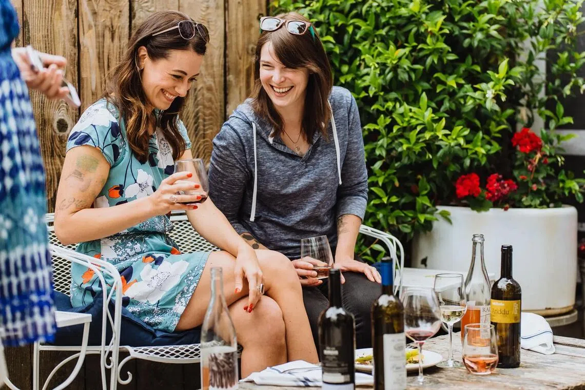 Kelly McCain, seated left, lent her best friend, Kate Williams, US$10,000 without a formal agreement. 