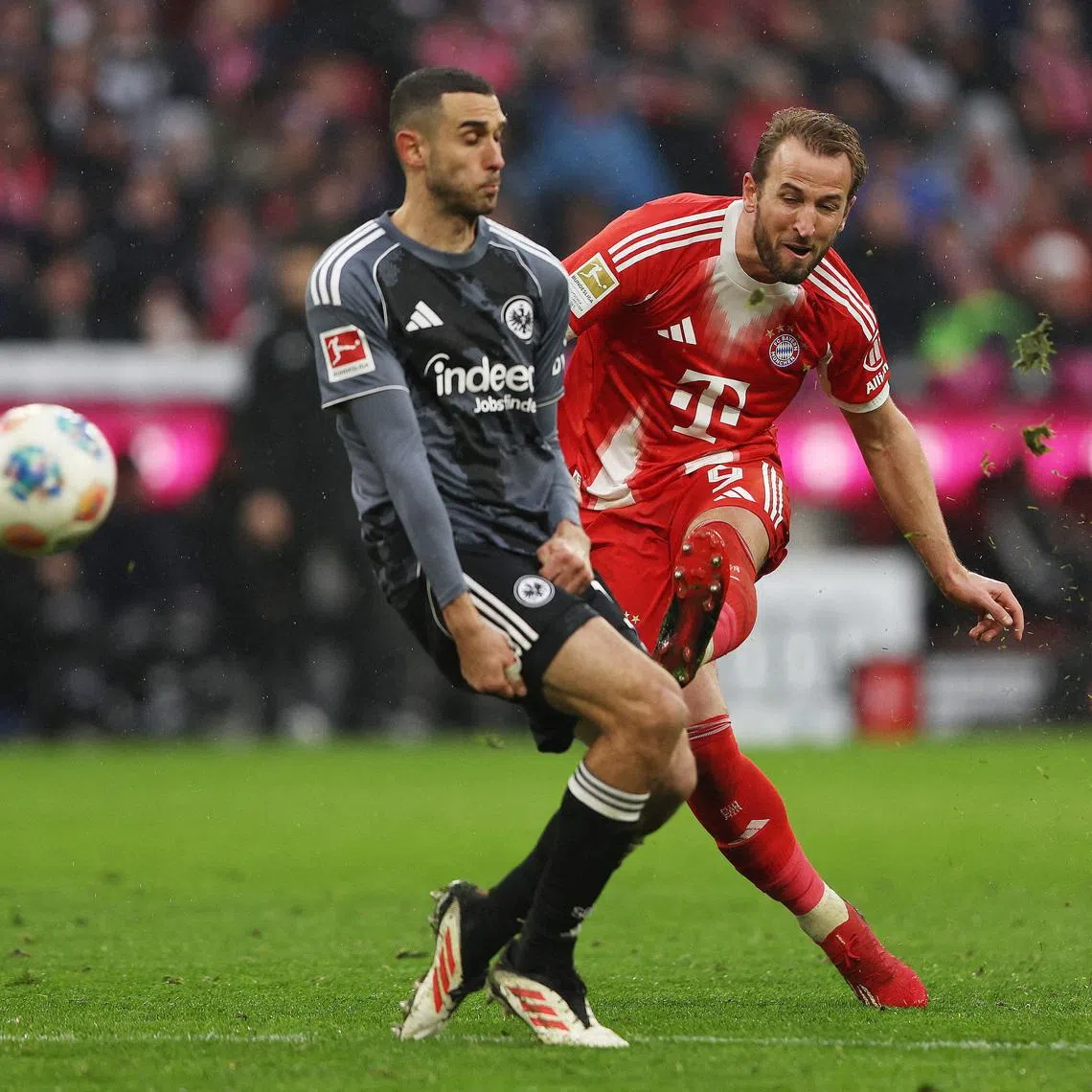 Soccer Football - Bundesliga - Bayern Munich v Eintracht Frankfurt - Allianz Arena, Munich, Germany - February 21, 2026 Bayern Munich's Harry Kane scores their third goal REUTERS/Maryam Majd