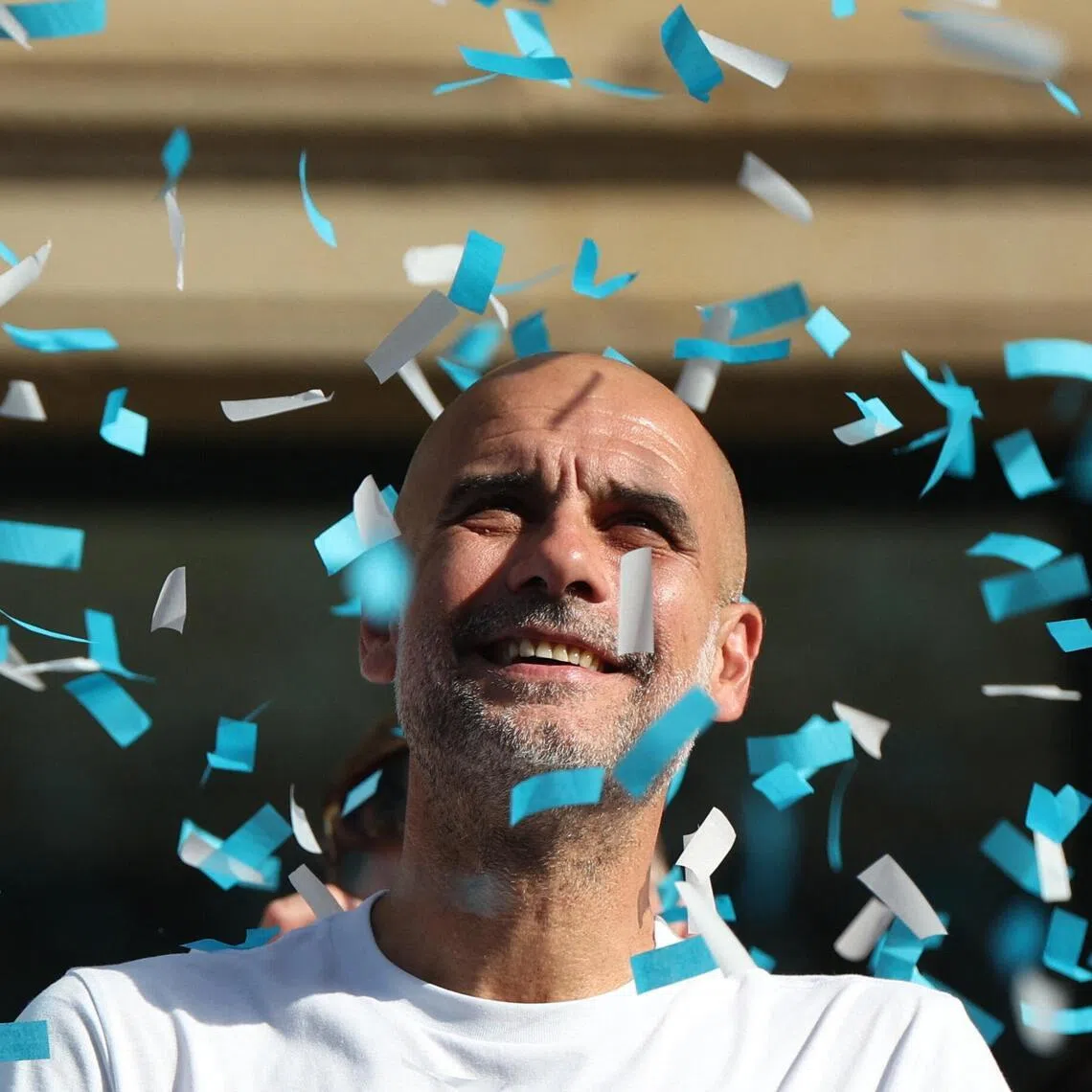Pep Guardiola enjoying Manchester City’s FA Cup and League Cup victory parade on May 25.