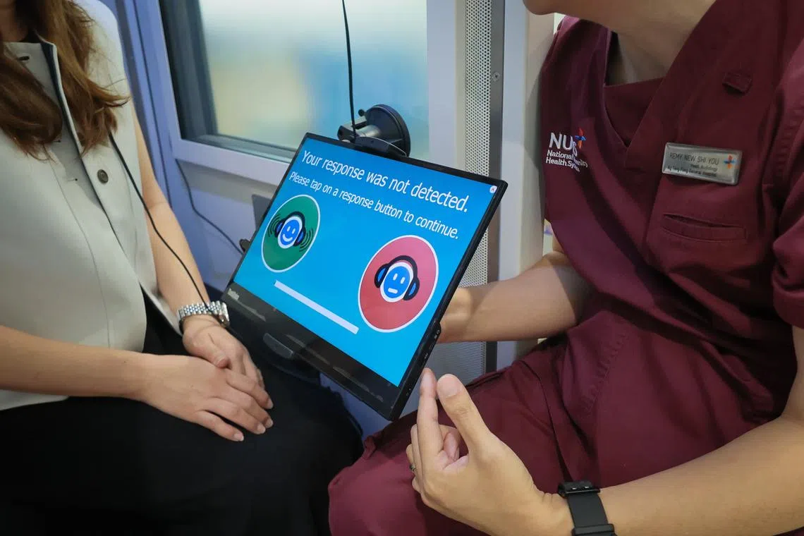 A tablet used by patients during hearing tests in a portable audiometry booth at Ng Teng Fong General Hospital on June 19.