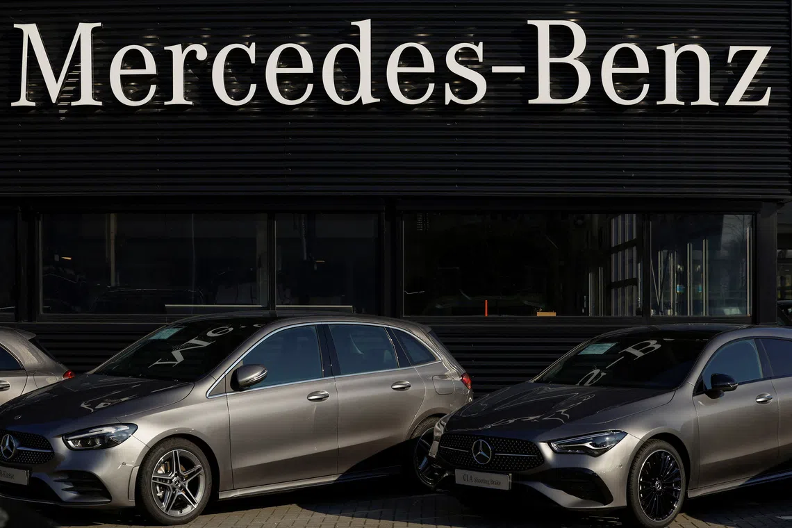 A Mercedes-Benz sign is seen outside a Mercedes-Benz car dealer in Arnhem, Netherlands February 18, 2025. REUTERS/Piroschka van de Wouw
