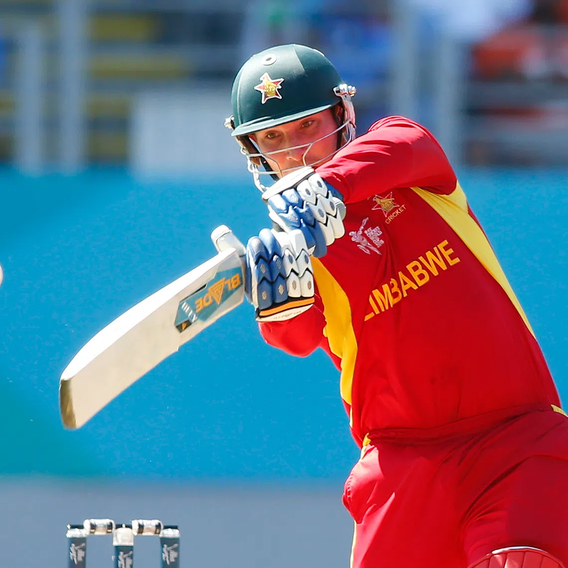Zimbabwe's Brendan Taylor hits a four during their Cricket World Cup match against India at Eden Park in Auckland, March 14, 2015. REUTERS/Nigel Marple