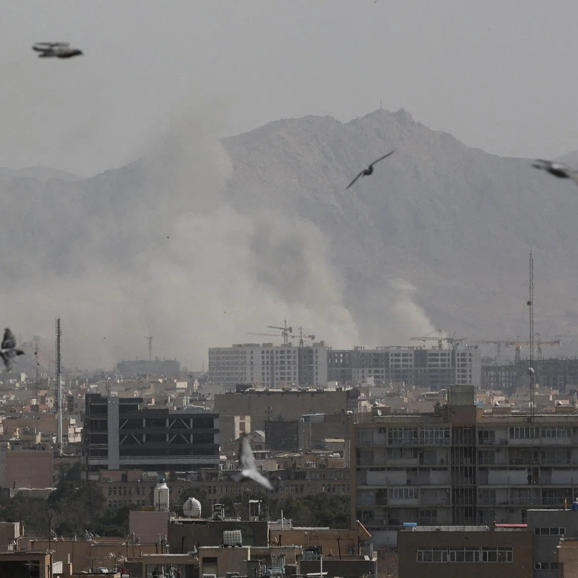 Smoke rises following an explosion, after Israel and the U.S. launched strikes on Iran, in Tehran, on Feb 28.