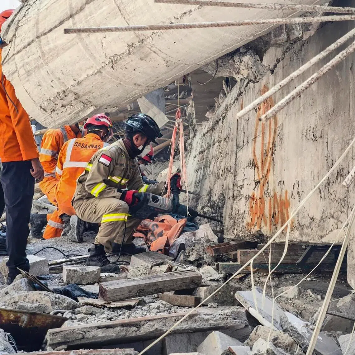 Rescuers searching for victims of a collapsed building at an Islamic boarding school in Sidoarjo, East Java, Indonesia, on Oct 3, 2025.