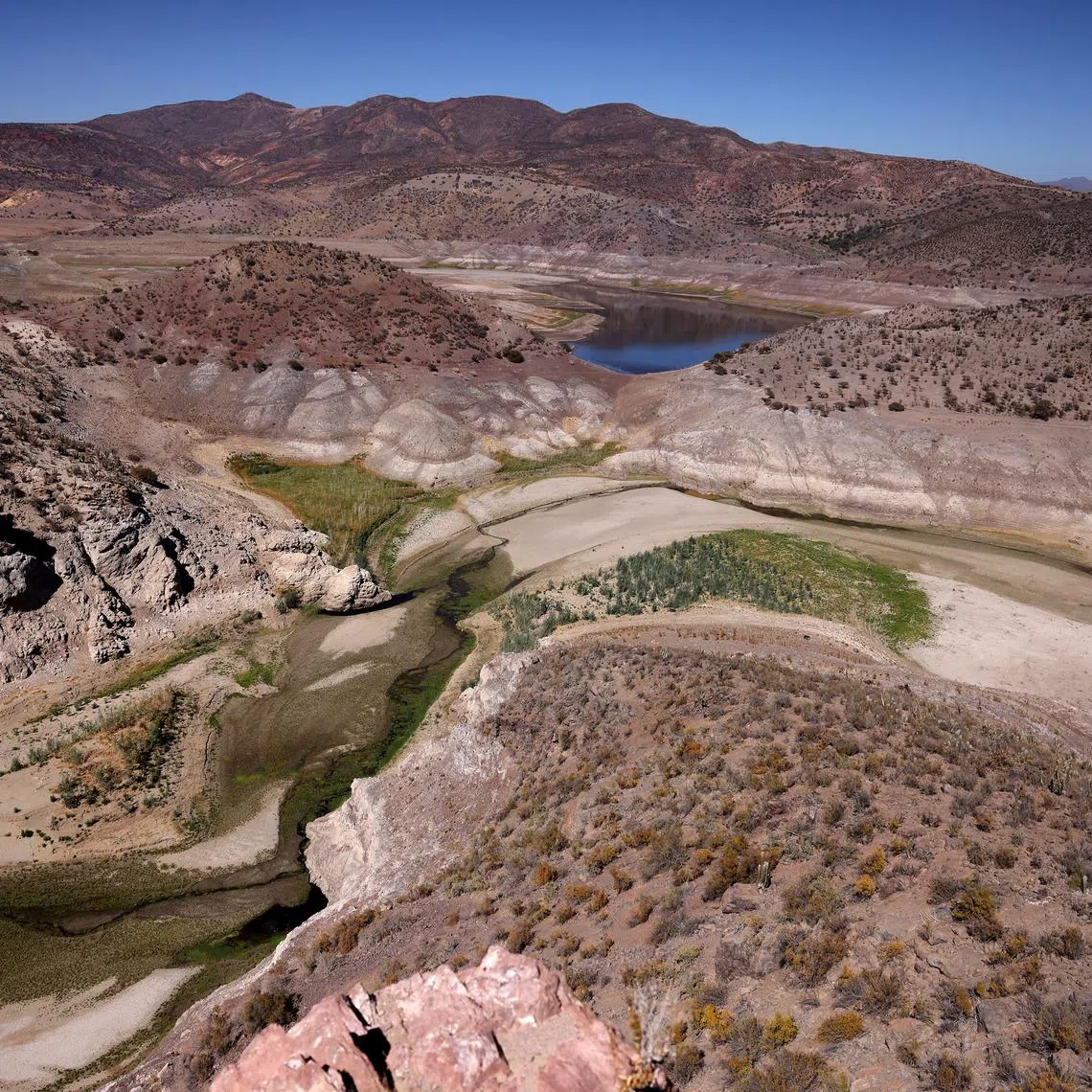 FILE PHOTO: A general view of the dried Cogoti reservoir, as water levels in the zone dropped to record lows, ahead of World Water Day at La Ligua area, in Coquimbo, Chile March 14, 2024. REUTERS/Ivan Alvarado/File Photo