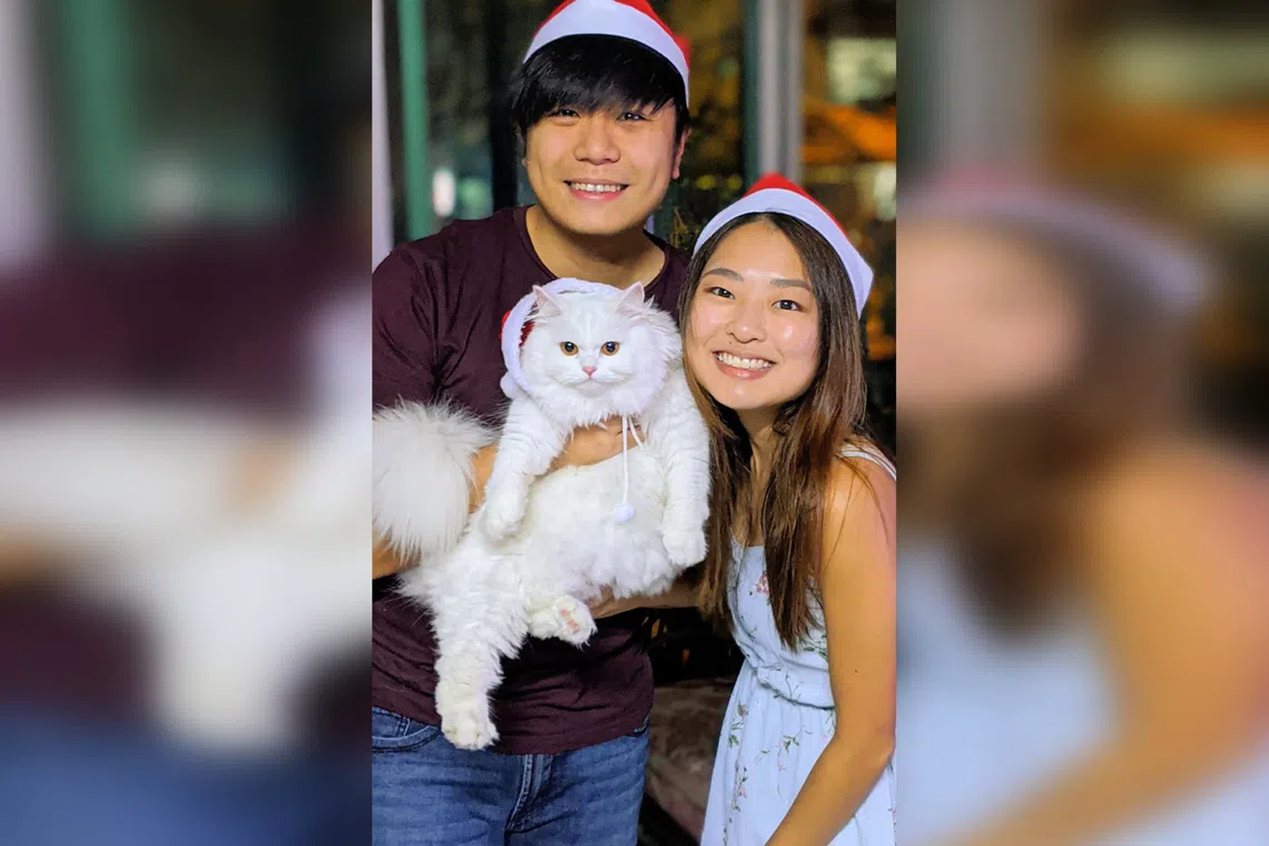 Kong Man Jing, also known as Biogirl MJ, with Raye Ng, her husband and co-founder of science and eco-focused educational media platform Just Keep Thinking, and Qwerty, their seven-year-old Persian fur kid.
